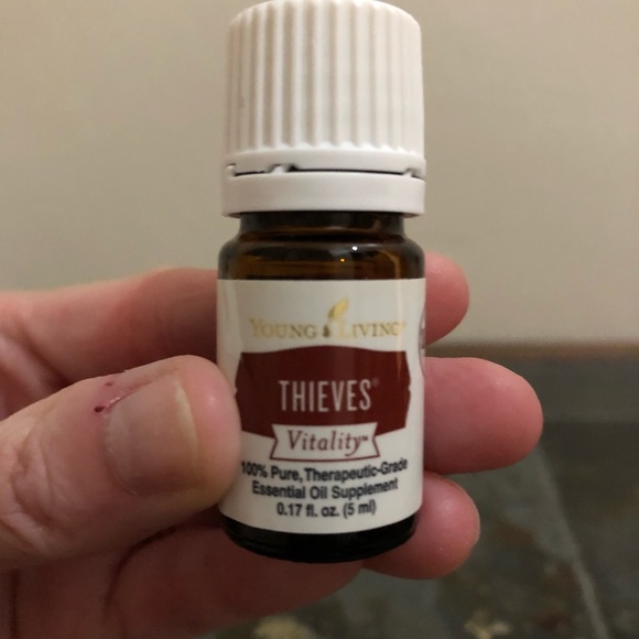 2 Young Living Thieves Essential Oil bottles